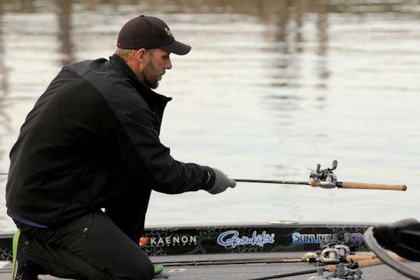<p>
	Aaron Martens finishes his tackle prep for the day.</p>
