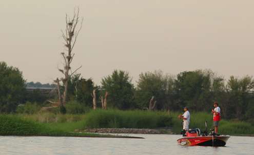 Elite Series pro Casey Scanlon fishes nearby the launch area early on Day One of the Bass Pro Shops Central Open.  