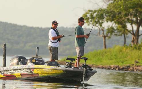 Derek Remitz and his co-angler, Mike Hoese, enjoy the morning of fishing together and swapping stories. 