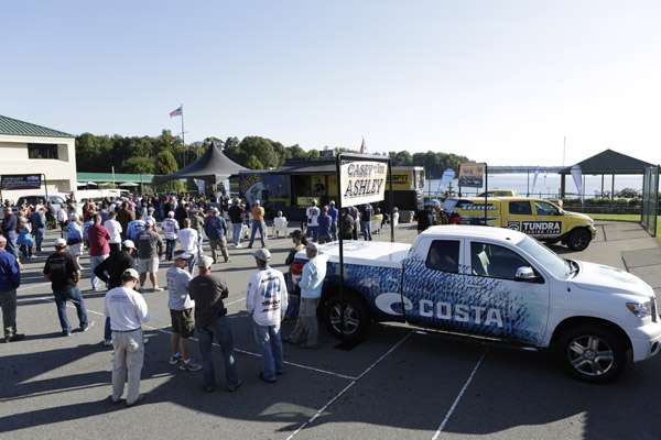 <p>Casey Ashley and other pros stood outside their trucks and chatted with competitors.</p>
