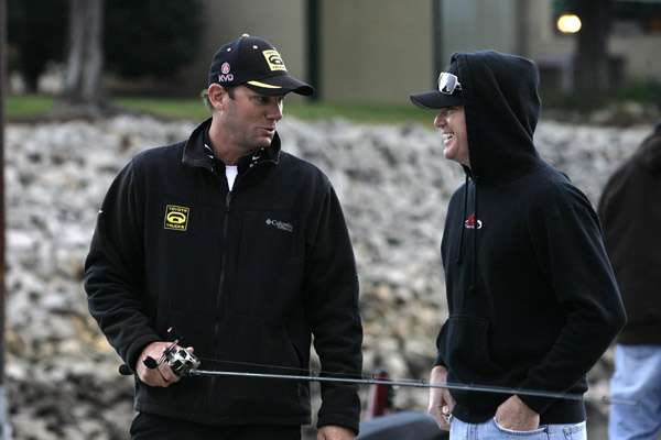 <p> </p>
<p>Kevin VanDam chats with truck racing champion Timothy Peters before they go fishing on Norman. Peters caught a bass while VanDam coached him on casting.</p>
