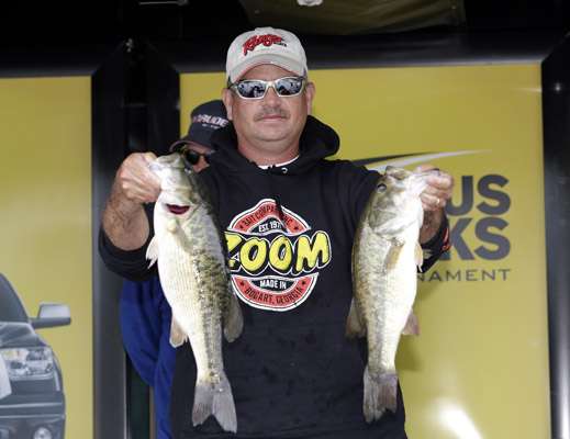 <p> </p>
<p>Todd Auten holds up his teamâs two biggest fish. He and his partner, Pat Tierney, won the event with 13 pounds, 1 ounce.</p>
