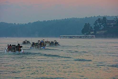 <p>The first flight of anglers idles onto Smith Lake to begin their first day of fishing.</p> 