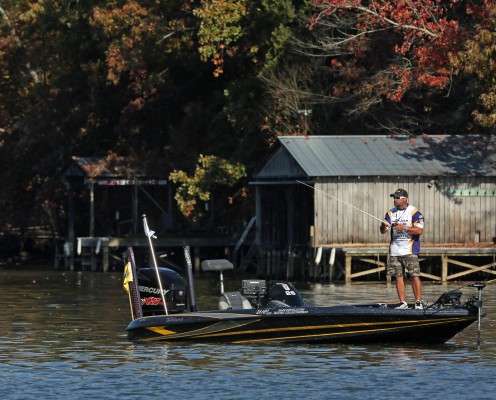 <p>Louisiana's Jason Pecoraro visits someone's wooden boathouse.</p>
