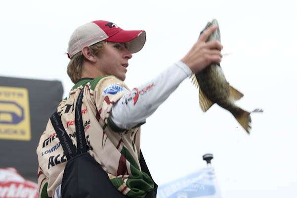 <p>Blake Betz from Louisiana quickly shows off his fish to the crowd.</p> 