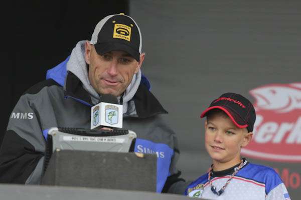 <p>Luke Farmer, Florida, watches the scales.</p>