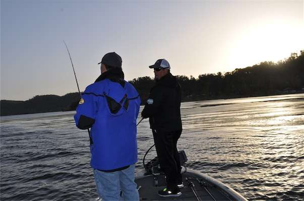 <p> </p>
<p>As the sun begins to rise over Lake Guntersvilleâs shoreline, Chris Lane and John Holtman discuss frog fishing techniques.</p>
