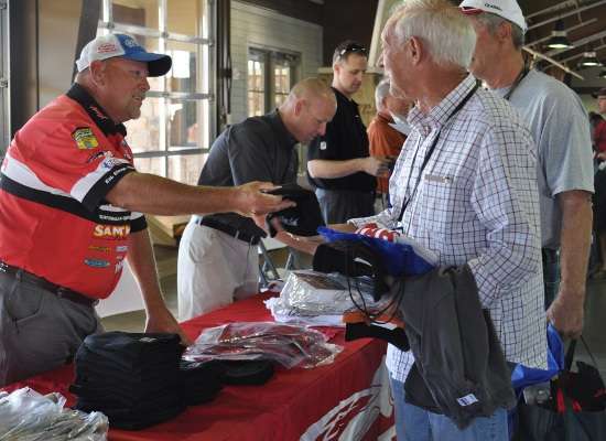 <p>Matt Herren, a Bassmaster Elite Series pro who lives in nearby Trussville, gave out Skeeter-branded hats to competitors.</p>
