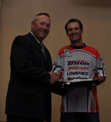 <p>Jonathan Carter accepts his award for finishing in ninth place and advancing to the 2013 Bassmaster Classic.</p> 