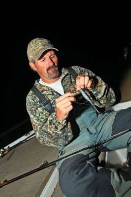 <p>Tournament leader Craig Daniel rigs a soft plastic swimbait for his big day on Smith Lake.</p> 