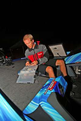 <p>Third-place finalist Kevin Hawk sorts through his choices in the hopes of landing a berth in the 2013 Bassmaster Classic. </p> 