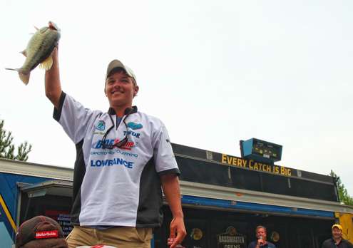 <p>Co-angler champion Carson Orellana pulls his best of the day from the live well.</p> 