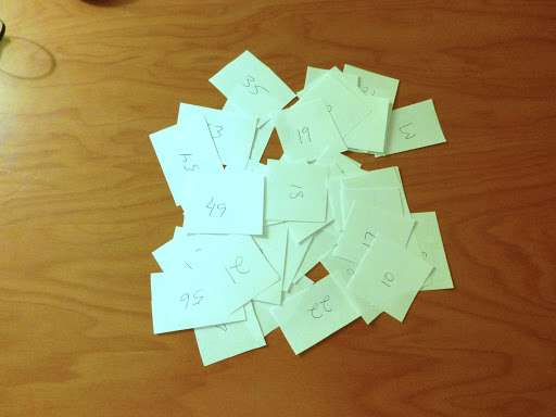 So....I cut up a sheet of paper into 56 pieces and on each piece I write a number...
