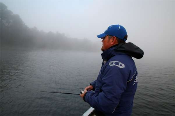 <p><strong>7:09 a.m. </strong>Unable to run Lake S due to dense fog, Reehm idles to a point near the launch ramp and makes his first cast with a bladed jig.</p>
