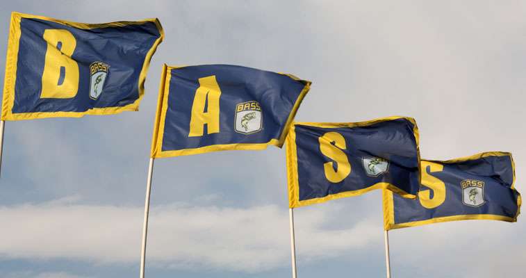 <p>The B.A.S.S. flags fly over the stage.</p>
