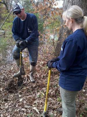 <p>Chris Brown and April Phillips work together during the planting phase.</p>
