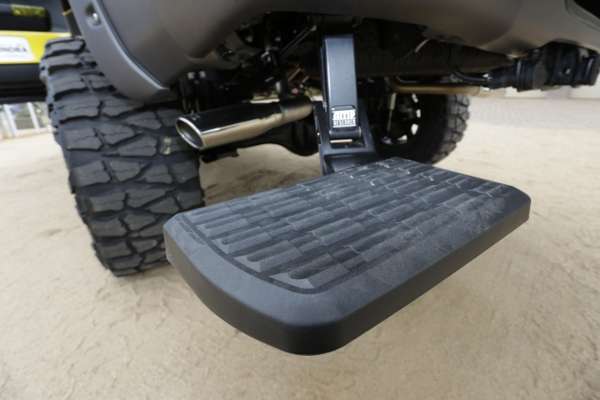 <p> </p>
<p>A bumper step drops down so the angler can access the tackle in the pull-out bed.</p>
