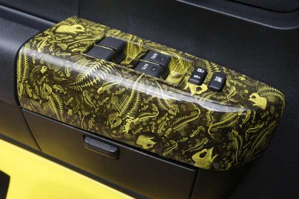 <p>A fishy pattern adorns the armrests, steering wheel and center console.</p>
