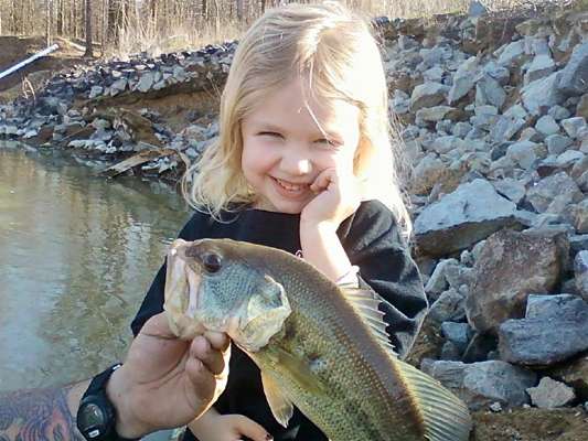 <p>
	Happiness is seeing a kid with a fish! That's the theme of this gallery, contributed by B.A.S.S. Facebook fans. Brenda Moore sent in this photo of her granddaughter Maddie with her first bass. âShe reeled it in but didnât want to touch it," said Moore. Do you have cute photos of kids fishing? <a href=