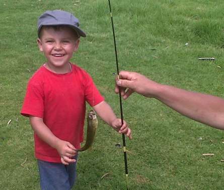 <p>
	 </p>
<p>
	This 3 1/2-year-old is proud of his first bass!</p>
