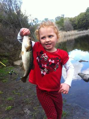 <p>
	Paige, 4, lips her first bass.</p>
