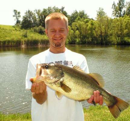 <p>
	Ryan Summers caught this bass in a private pond in north Missouri that has been in his family for more than 30 years. "I caught it on a black and blue ChatterBait," he said. The bass weighed in at 7.7 pounds.</p>
