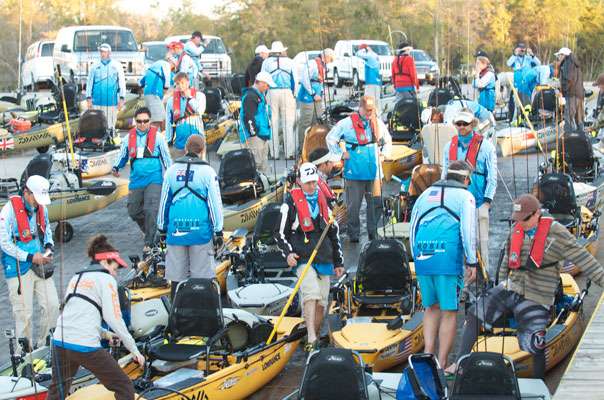 <p>Anglers arrive and scurry to their places in preparation for the launch on the first official day of competition.</p>
