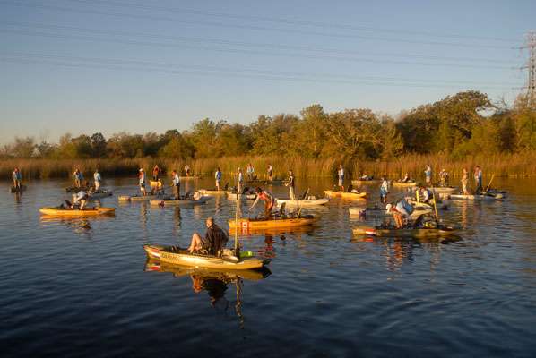 <p>The 42 anglers competing at Lake Bastrop in Austin, Texas, who represent 13 different countries around the world, pay respect to their hosts' national anthem. </p>
