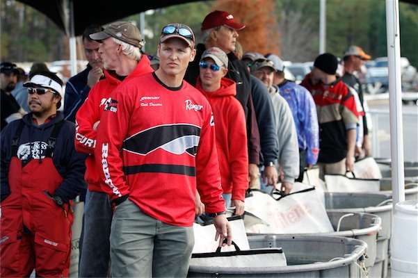 <p>Anglers anxiously wait at the holding tanks for their turn on the weigh-in stage.</p>
