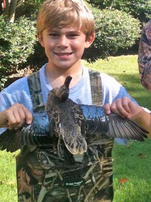 <p>Chris Lane takes his kids fishing and hunting whenever he can. His son, Cal, shot this duck at home this fall.</p>
