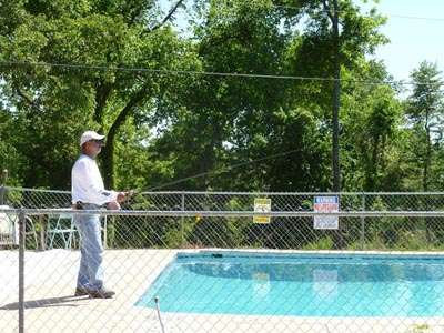 <p>...and my favorite shot of my other roommate, Paul Elias, as he tests out new bait stuff in a motel swimming pool.</p>
