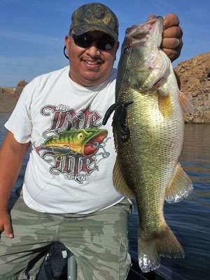 <p>Hector Hinojosa caught this 9 1/2-pounder on Kawhea Lake in summer, dragging a Mojo rigged with a red and gold flake Keeper Baits bug.</p>

