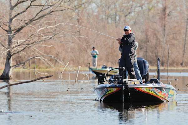 <p>Keith Poche sets the hook for a lunker bass at the 2012 Bassmaster Classic on the Red River. In his first-ever Classic appearance, Poche brought in a total of 41 pounds, 3 ounces, earning him a third-place finish and $40,000 in winnings. Off to a good start!</p>
