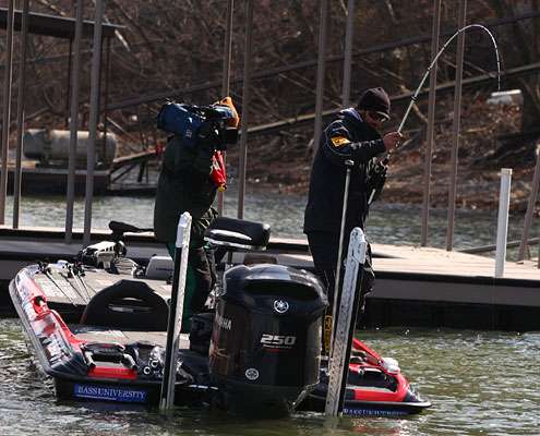 <p>Iaconelli hooks up with another bass. He had caught 10 by 10 a.m., but had trouble improving on his limit.</p>
