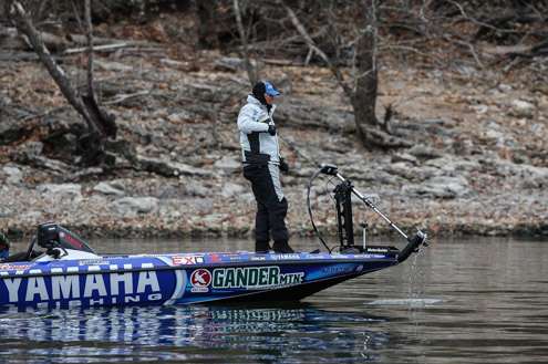 Dean Rojas lifts his trolling motor to make a move down the lake.
