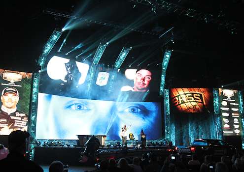 <p>Jason Christie on stage as he is introduced as part of the Super Six.</p>