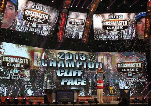 <p>Pace hoists the trophy as the 2013 Bassmaster Classic Champion.</p>
