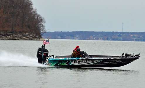 <p>2013 Bassmaster Classic champ Chris Lane speeds to his next spot as he looks to defend his title on Grand Lake.</p>
