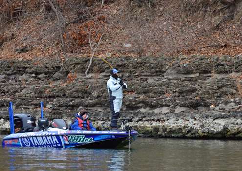 <p>Dean Rojas works his way along a rocky bank with a jerkbait. His Gill KB1 outerwear reminded some observers of a fire-retardant NASCAR jumpsuit.</p>
