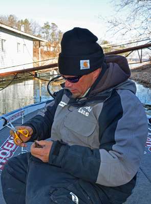 <p>Lane also threw a jig, which he's retying after tossing his line over a cable.</p>
