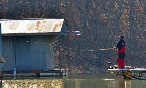 <p>Evers fires a cast parallel to a dock.</p>

