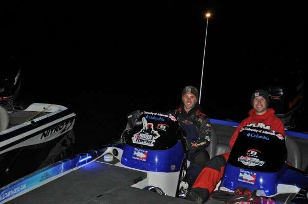 <p>Anderson and Drew Proto of Arkansas wait in their boat while the other anglers drop in.</p>
