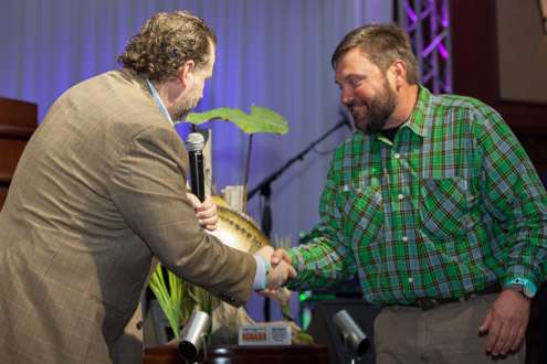 <p>Tim Humes from Carhartt presents Greg Hackney with the Big Bass award for a 10-pound, 9-ounce brute Hackney weighed in the St Johns River Elite event. Carhartt is the offical clothing sponsor for B.A.S.S.</p>
