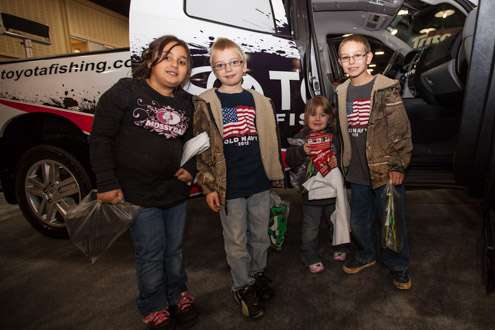<p>Mercedes, age eight, Riddick, eight, William, nine, and Esabella, three, are taking in the events held in the Toyota booth today. KVD is the favorite of this group from Sapulpa, Okla.</p>
