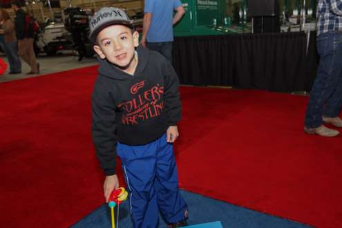 <p>Dominick, age seven, from Tulsa, Okla., is taking his turn at the National booth.</p>
