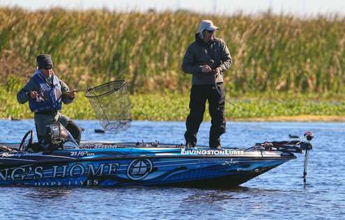 <p>Howell hooks up with a bass on a lipless crankbait.</p>
