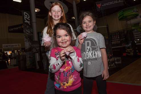 <p>What's more kid friendly at an expo than cotton candy? Madison, 4; Tatum, 10; and Ava, 7, all from Oologah, Okla., enjoy some of the sweet stuff at the packed expo at the Tulsa Convention Center.</p>
