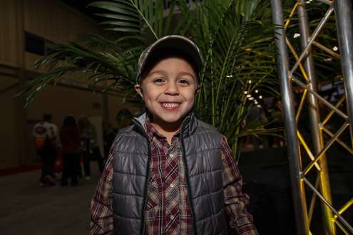 <p>Rogan, 4, from Tulsa, is full of smiles while checking out the Bassmaster Classic Expo presented by Dick's Sporting Goods.</p>
