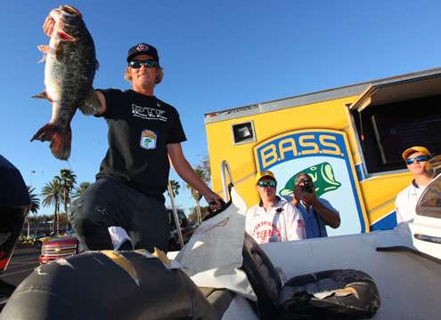 <p> </p>
<p>Daniel Lanier pulls his heaviest fish of the day from the live well. Lanier finished tied with Richard Howes at the end of the day. The winner will be decided tomorrow in a fish-off. </p>
