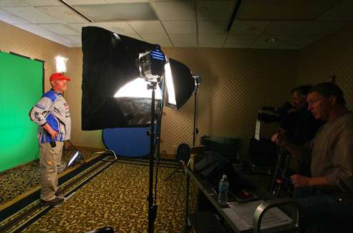 <p>The first stop for Classic anglers at registration was a room to have their head shots taken for Bassmaster television. Classic rookie Andy Bravence takes his turn.</p>
